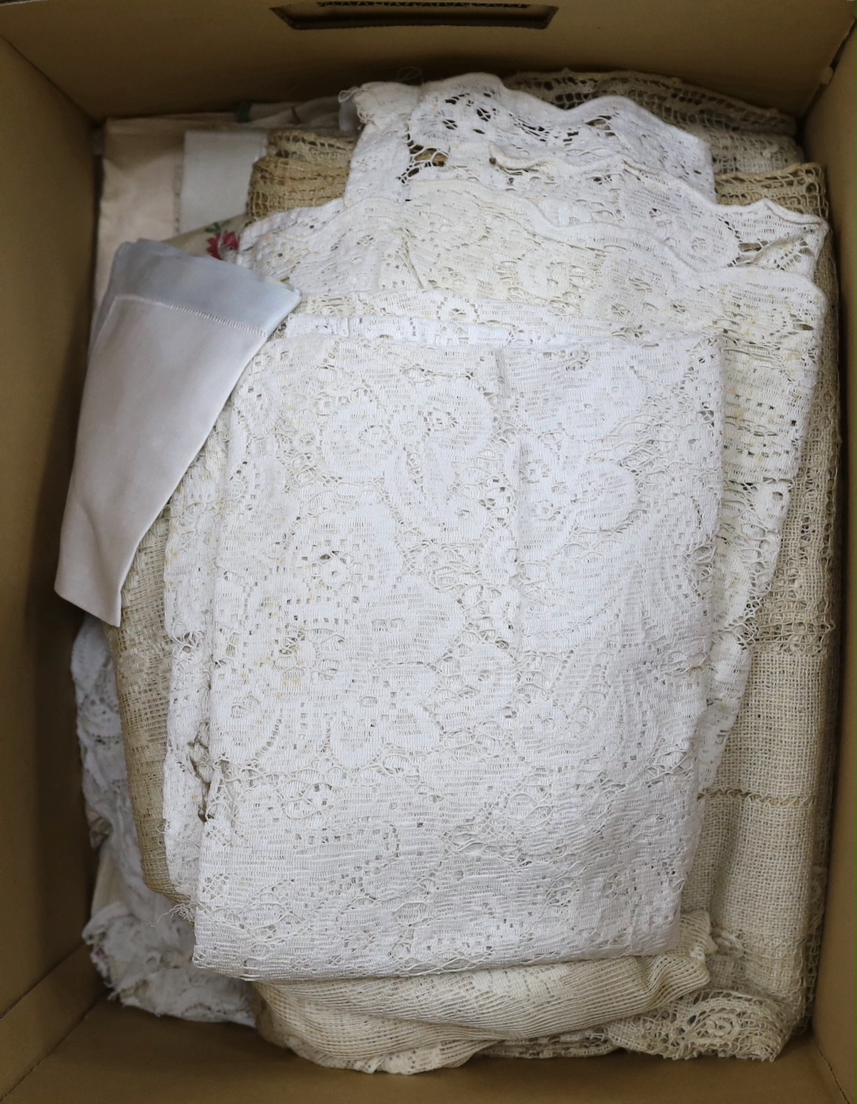 A collection of mostly 20th century machine lace curtaining together with similar lace edged linens